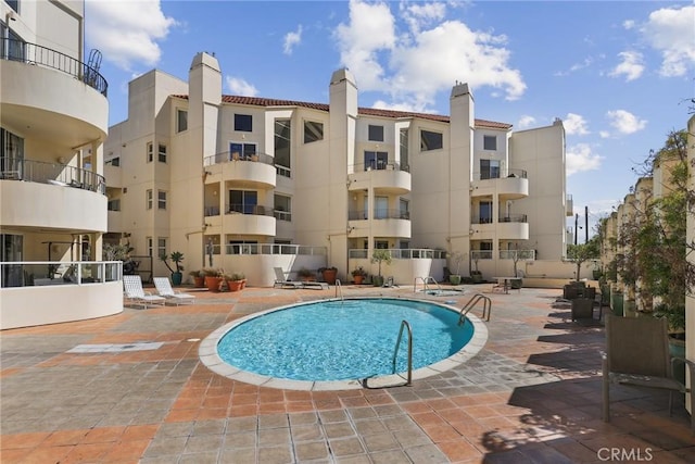 pool featuring a patio area