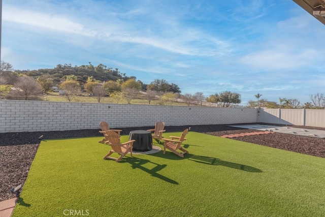 view of yard featuring a fenced backyard