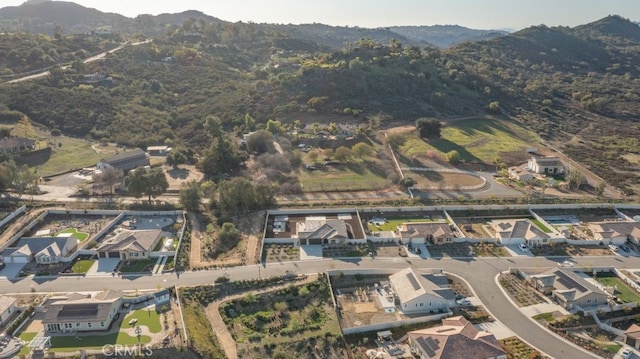 bird's eye view featuring a mountain view and a residential view