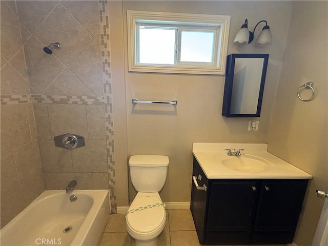 bathroom with toilet, tile patterned flooring, baseboards, bathtub / shower combination, and vanity