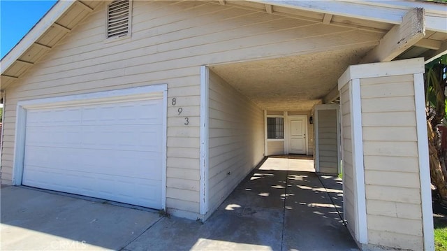 view of home's exterior with a garage