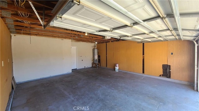 garage featuring secured water heater