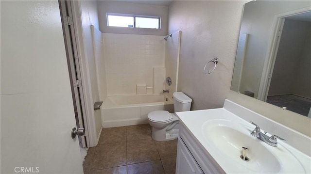 full bathroom featuring vanity, tile patterned floors, toilet, and bathtub / shower combination