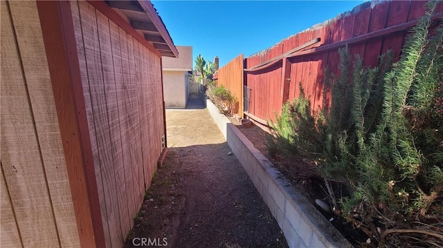 view of property exterior featuring fence