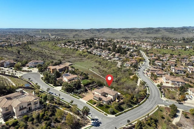 bird's eye view featuring a mountain view and a residential view