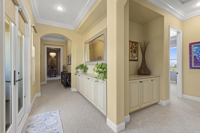 hallway with crown molding, recessed lighting, light colored carpet, and baseboards