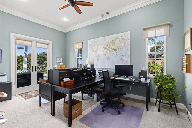 home office featuring carpet, crown molding, baseboards, and visible vents