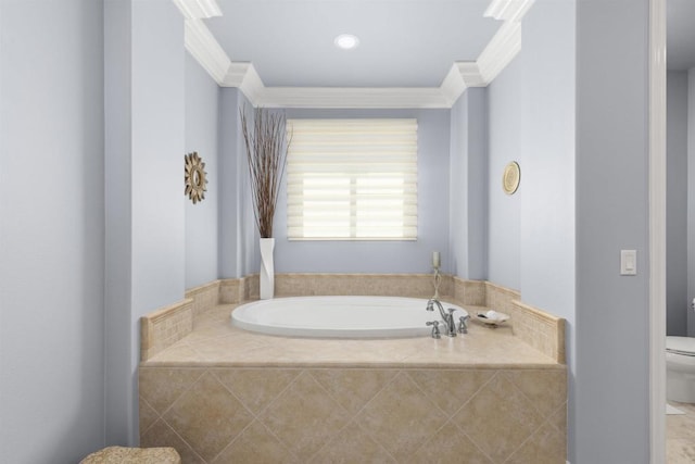 bathroom featuring a garden tub, toilet, and ornamental molding