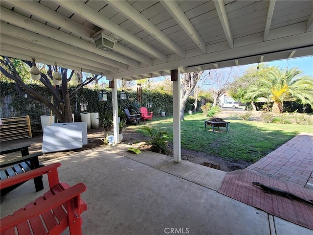 view of patio / terrace featuring a fire pit