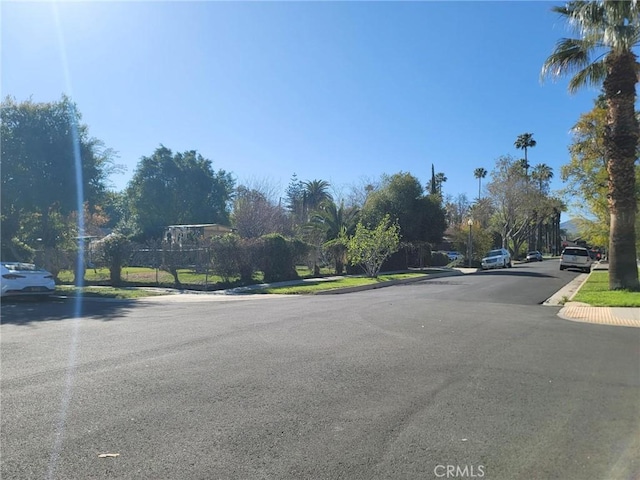 view of street with curbs and sidewalks