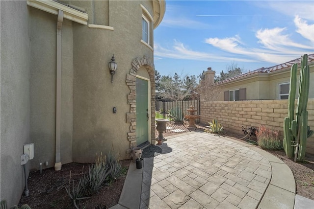 view of patio / terrace with fence