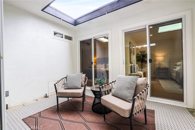 sunroom / solarium with a skylight