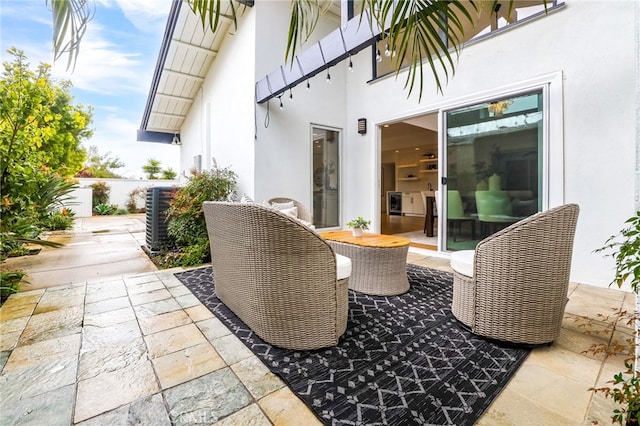 view of patio featuring fence