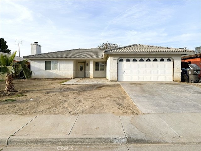 single story home with stucco siding, driveway, an attached garage, a chimney, and a tiled roof