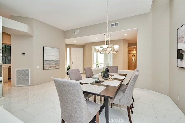 dining area featuring recessed lighting, visible vents, and marble finish floor