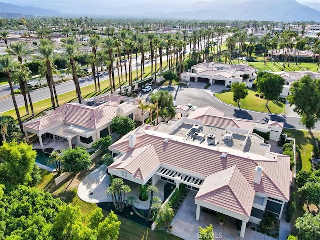 drone / aerial view featuring a mountain view and a residential view