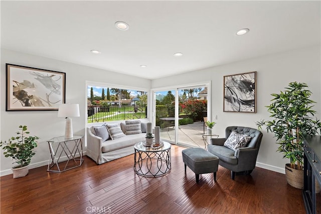 sitting room featuring recessed lighting, baseboards, and wood finished floors