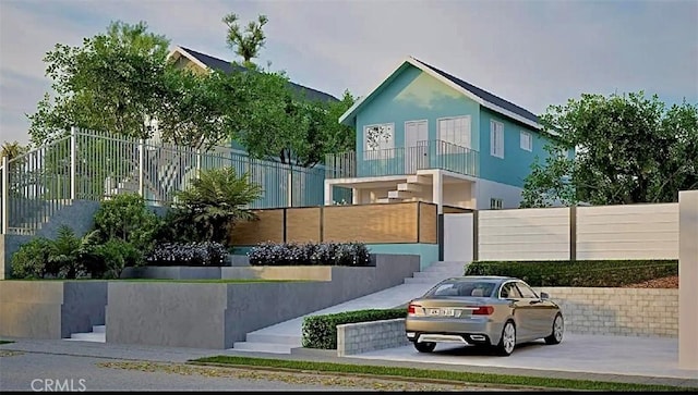 view of front of home with fence