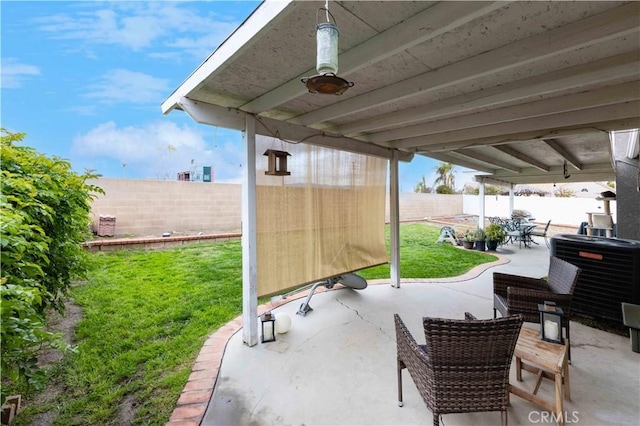 view of patio featuring a fenced backyard