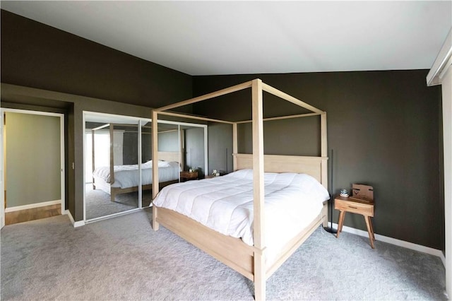 carpeted bedroom with baseboards