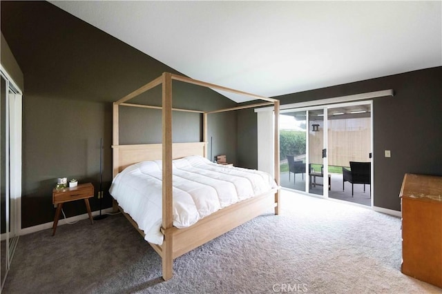 carpeted bedroom featuring access to exterior, lofted ceiling, and baseboards