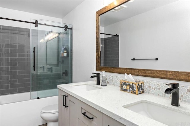 1905 Oxford Ct, Vista, CA 92081 - bathroom with double vanity, enclosed tub / shower combo, and tasteful backsplash