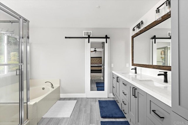 1905 Oxford Ct, Vista, CA 92081 - bathroom with double vanity, a garden tub, and a stall shower