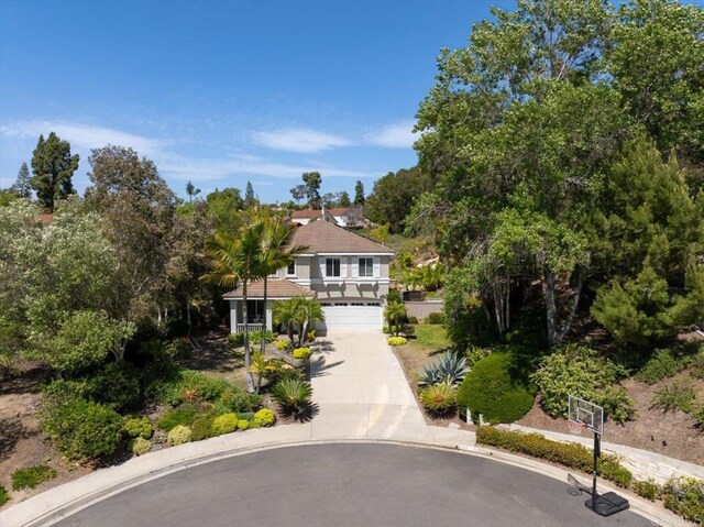 1905 Oxford Ct, Vista, CA 92081 - view of front of property with driveway, an attached garage, and a balcony
