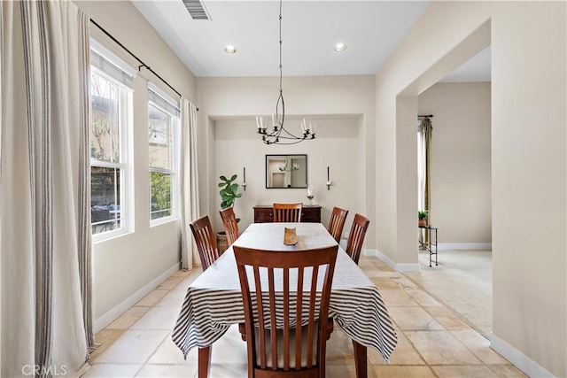 dining room with visible vents, recessed lighting, an inviting chandelier, and baseboards