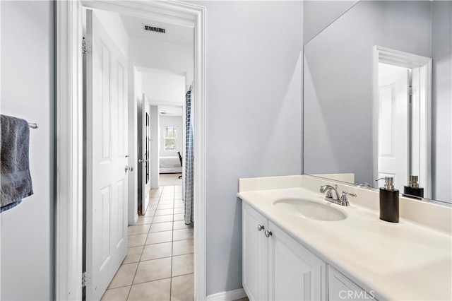 bathroom featuring vanity, tile patterned floors, and visible vents