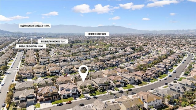 birds eye view of property featuring a residential view and a mountain view