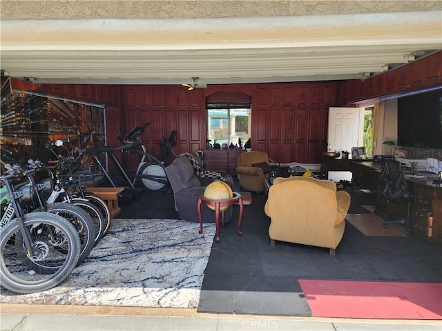 garage featuring wood walls