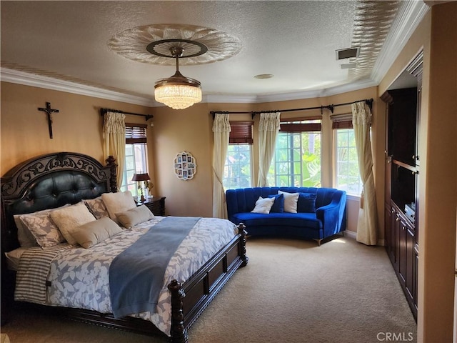 carpeted bedroom with a textured ceiling, crown molding, and baseboards