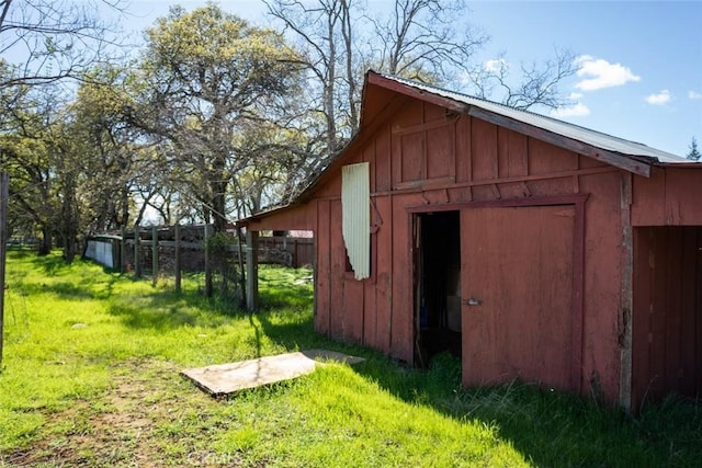 view of outdoor structure with an outdoor structure and fence