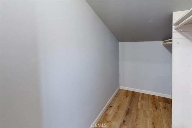 walk in closet featuring light wood-style floors