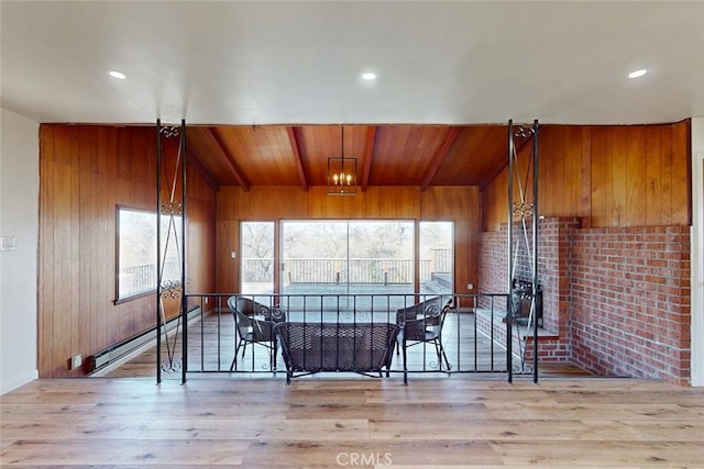 interior space featuring wooden ceiling and a baseboard radiator