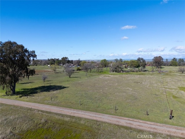 view of yard with a rural view