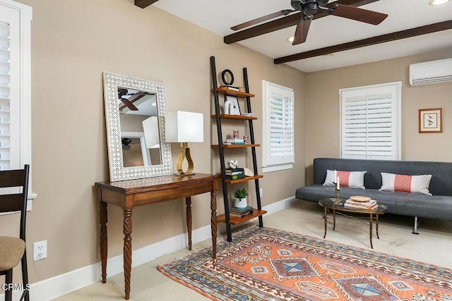 carpeted office space featuring an AC wall unit, beamed ceiling, a ceiling fan, and baseboards