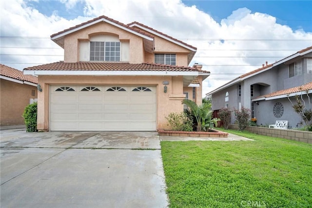 view of front of home with a front lawn, concrete driveway, a tile roof, stucco siding, and a garage