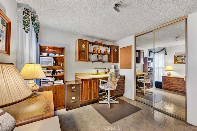 office featuring a textured ceiling