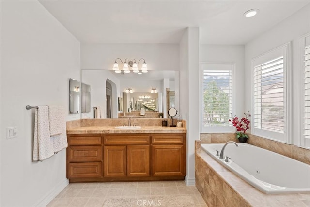 12680 Encino Ct, Rancho Cucamonga, CA 91739 - bathroom featuring a garden tub, vanity, and a chandelier