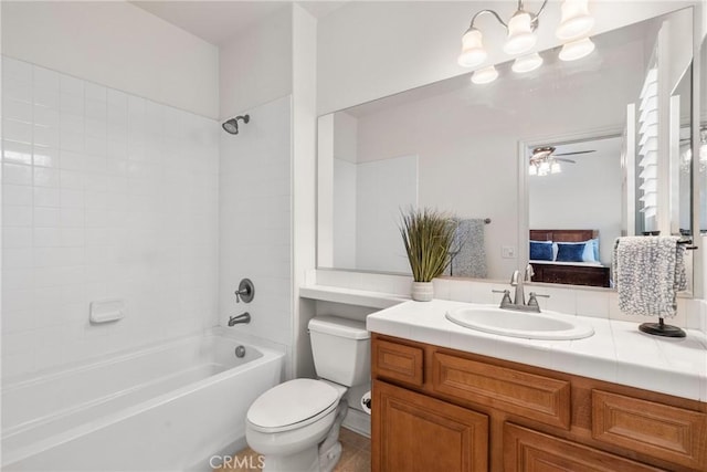 12680 Encino Ct, Rancho Cucamonga, CA 91739 - full bath featuring toilet,  shower combination, vanity, a ceiling fan, and ensuite bathroom