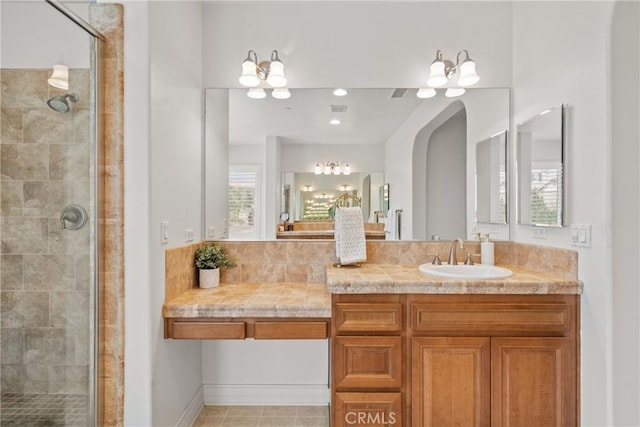12680 Encino Ct, Rancho Cucamonga, CA 91739 - bathroom with a shower stall, vanity, and a chandelier