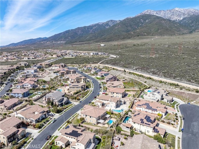 12680 Encino Ct, Rancho Cucamonga, CA 91739 - aerial overview of property's location with nearby suburban area and a mountain backdrop