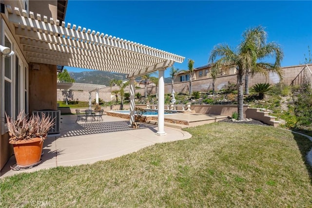 view of yard with an outdoor pool, a patio, fence, and a pergola