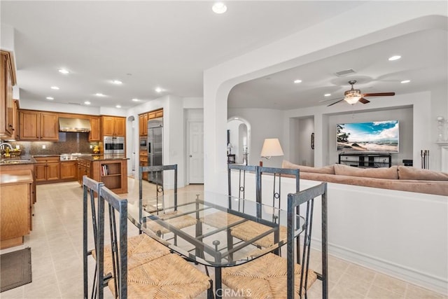 12680 Encino Ct, Rancho Cucamonga, CA 91739 - dining room with recessed lighting, ceiling fan, and arched walkways