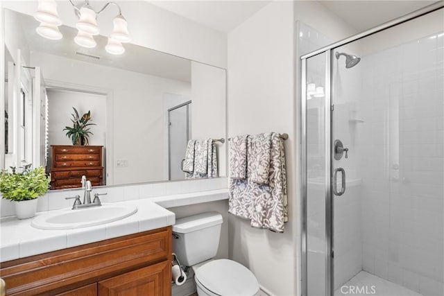 12680 Encino Ct, Rancho Cucamonga, CA 91739 - bathroom featuring a shower stall, toilet, and vanity