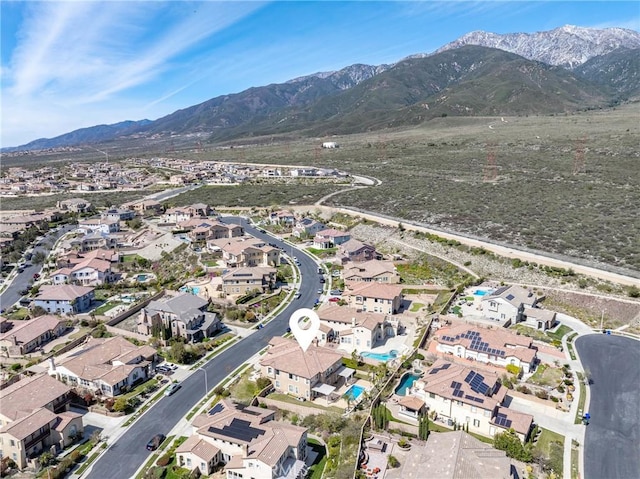 birds eye view of property featuring a residential view and a mountain view