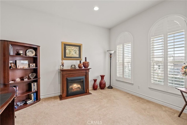 12680 Encino Ct, Rancho Cucamonga, CA 91739 - office area with carpet, a glass covered fireplace, baseboards, and recessed lighting