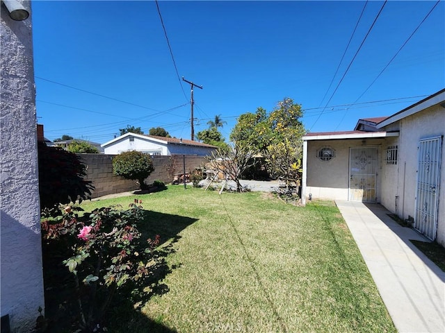 view of yard with fence